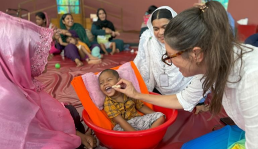 Dr Amanda working with local families during her babiEAT research in Bangladesh 